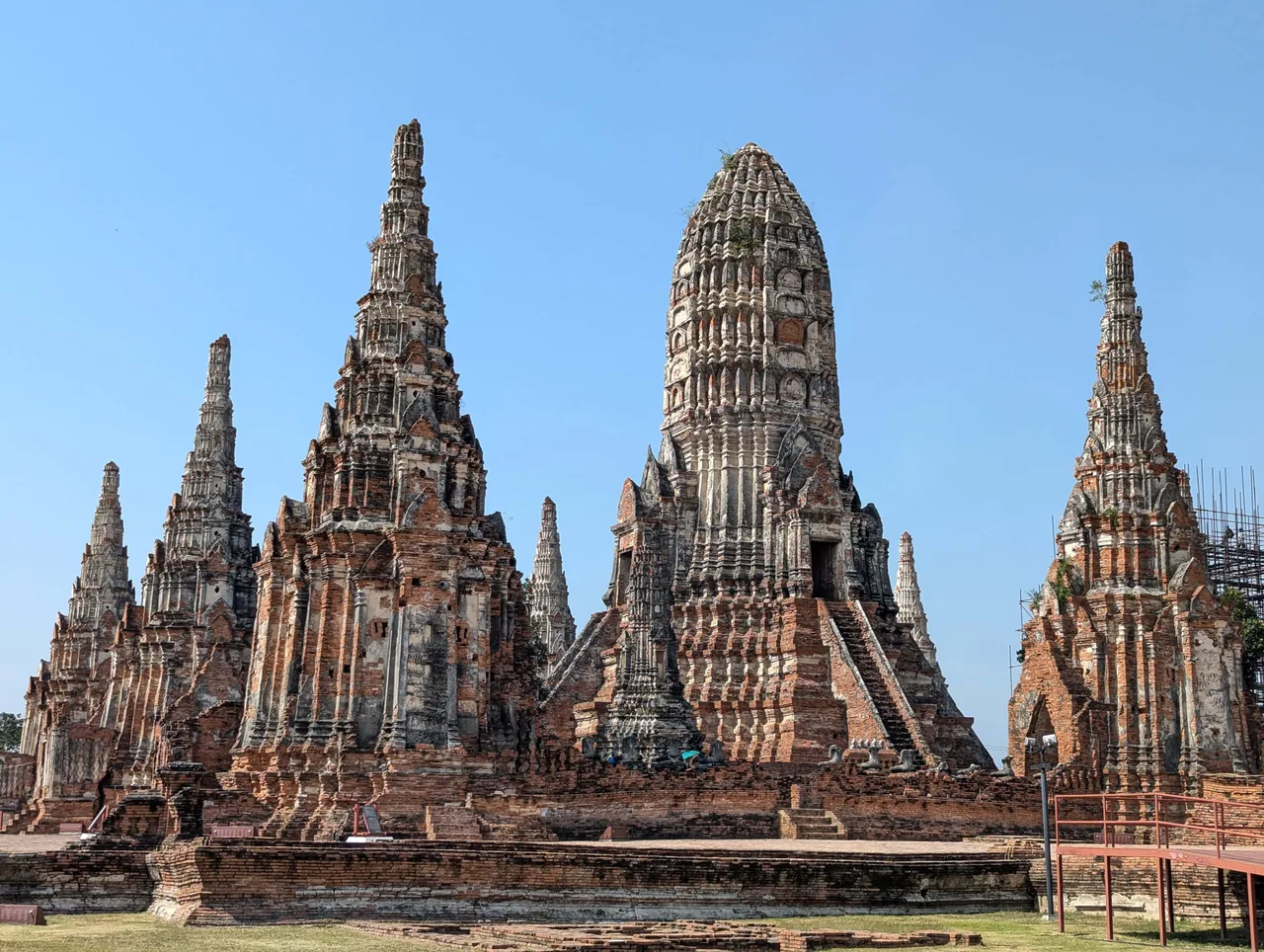 Weathered brick towers and temple ruins at Wat Chaiwatthanaram in Ayutthaya, Thailand